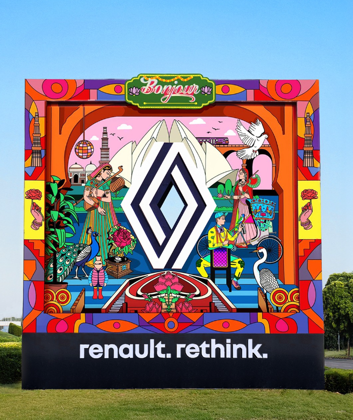 Colourful hand-painted installation framing the Renault logo